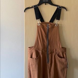 Brand new Rust colored jogger overalls.